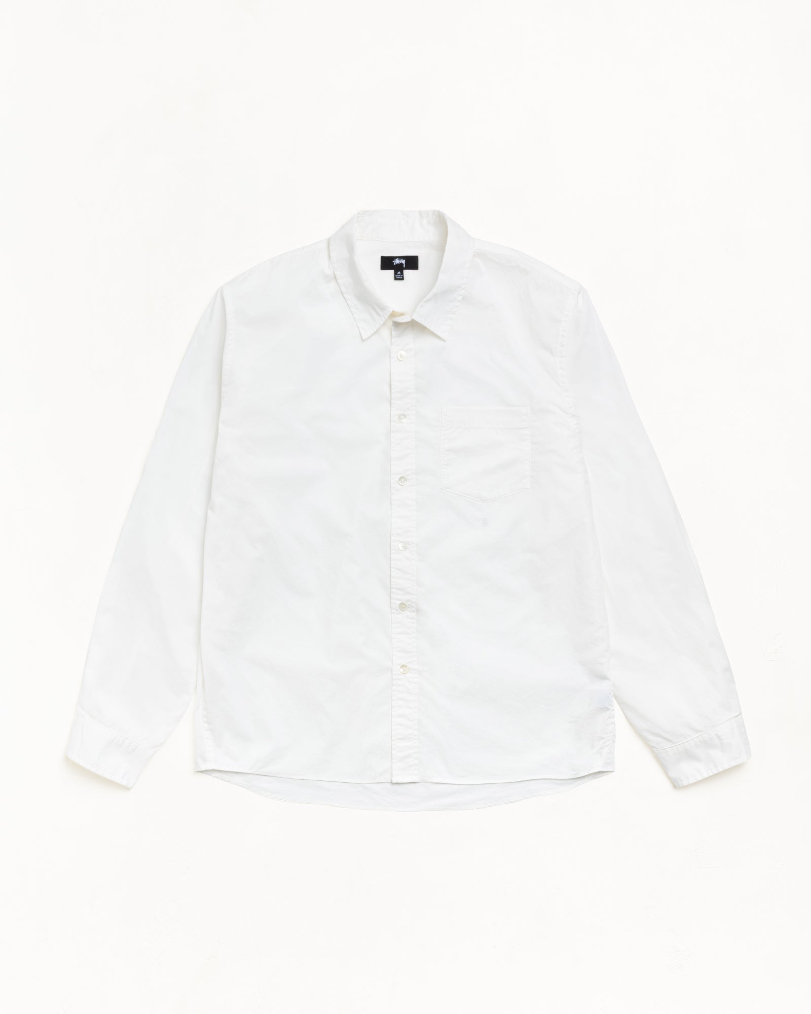 Unisex white long-sleeve button-through shirt with chest pocket and curved hem