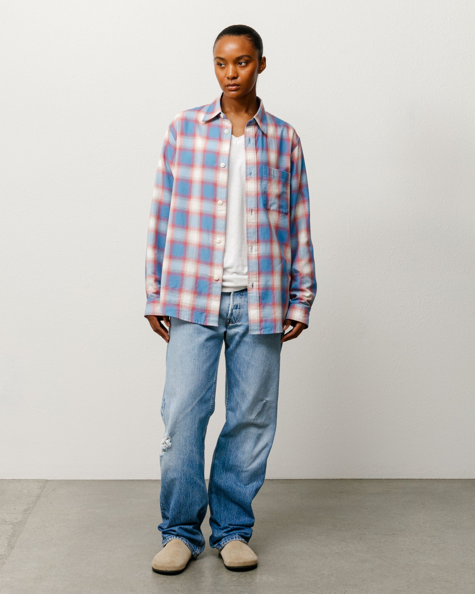 Blue ombre plaid long-sleeve shirt, worn open over a white tee on model