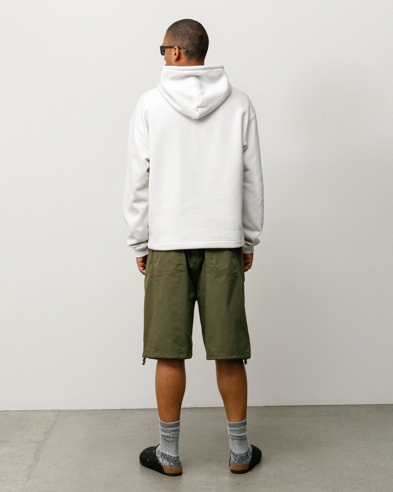 Surplus Short Unisex Regular In Olive, Rear View Showing Patch Pockets And Drawcord Hems