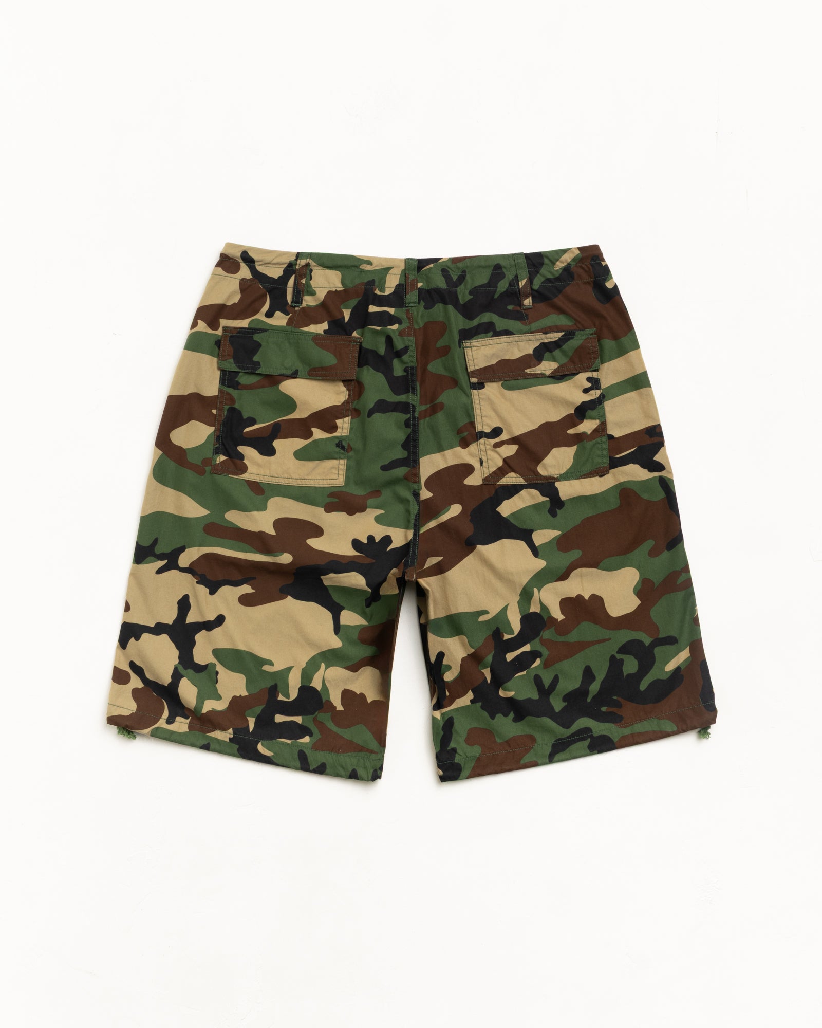 Woodland camo cotton-nylon baggy shorts with rear patch pockets, back view