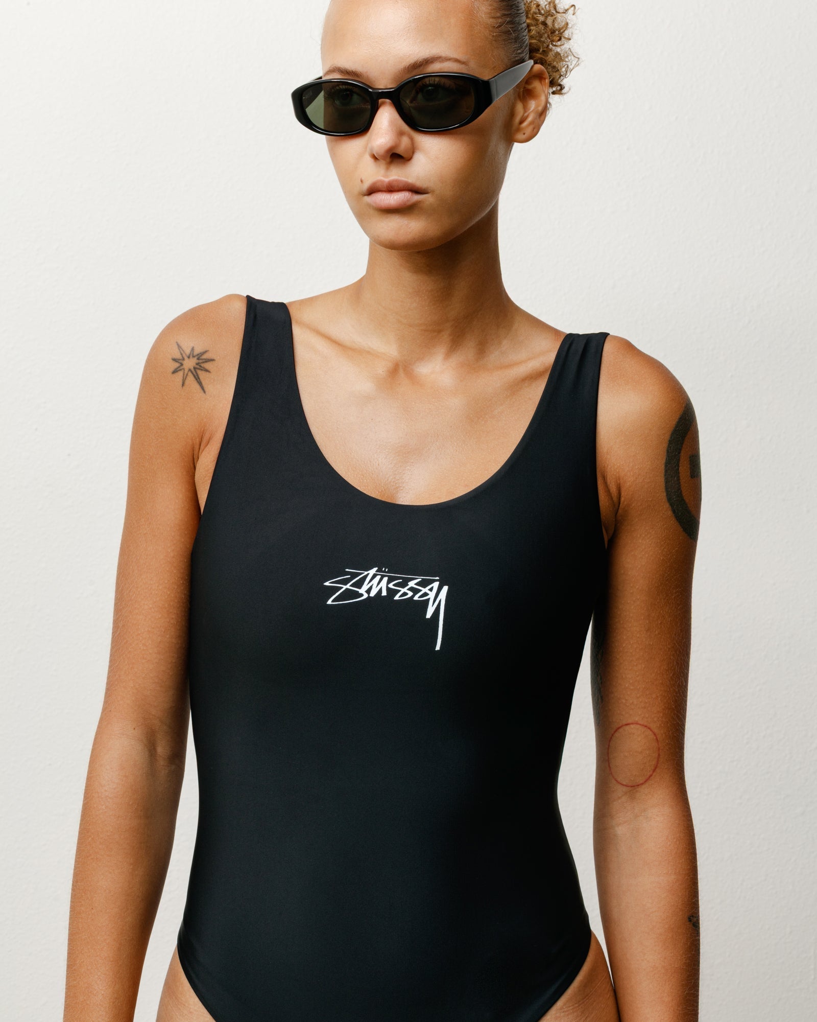 Stüssy Surf Stock One Piece Swimsuit in the colour Black