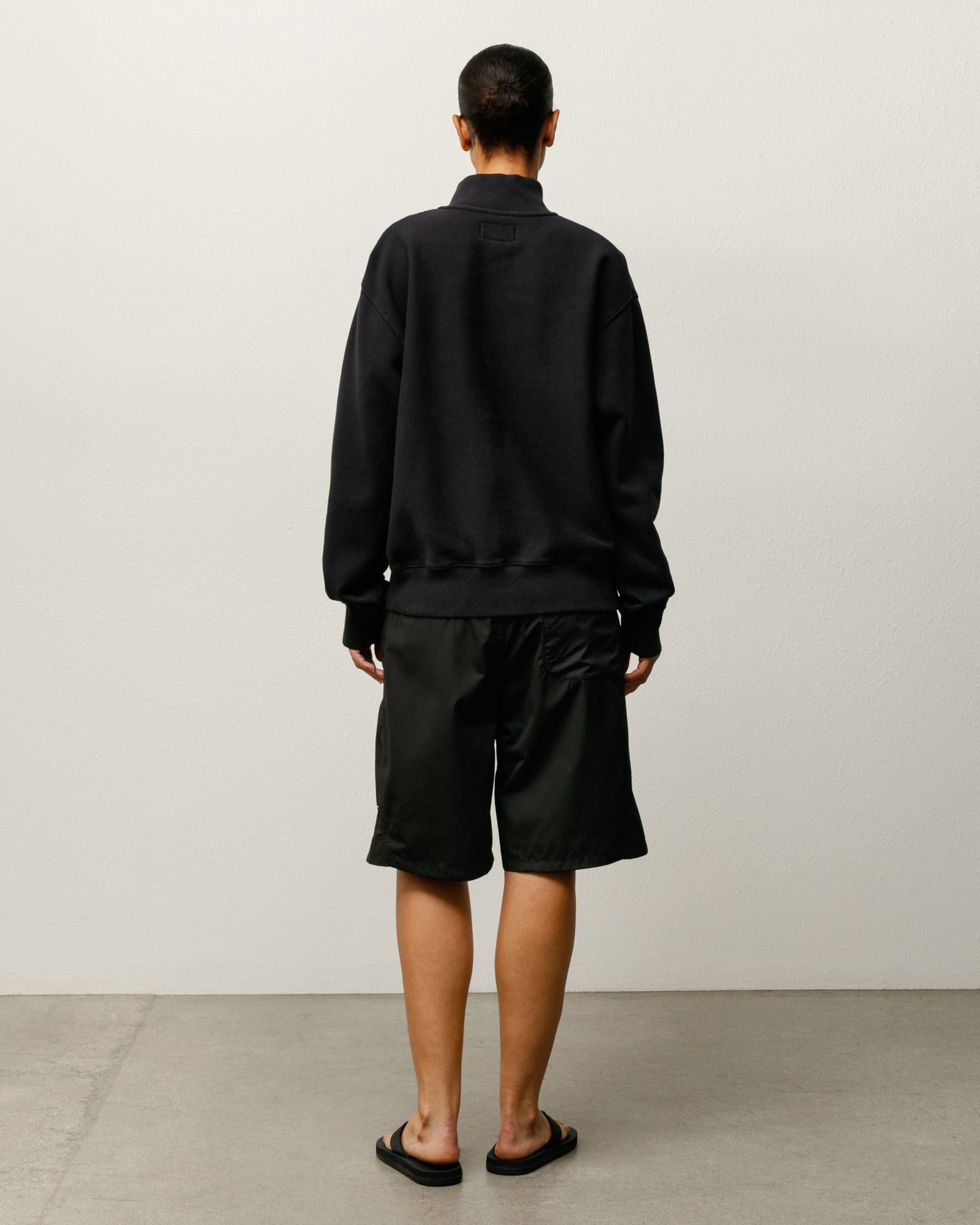 Curved Panel Board Short Bottoms in the colour Black