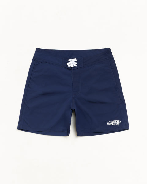 Blue board shorts with white lace-up waistband and logo embroidery at left hem