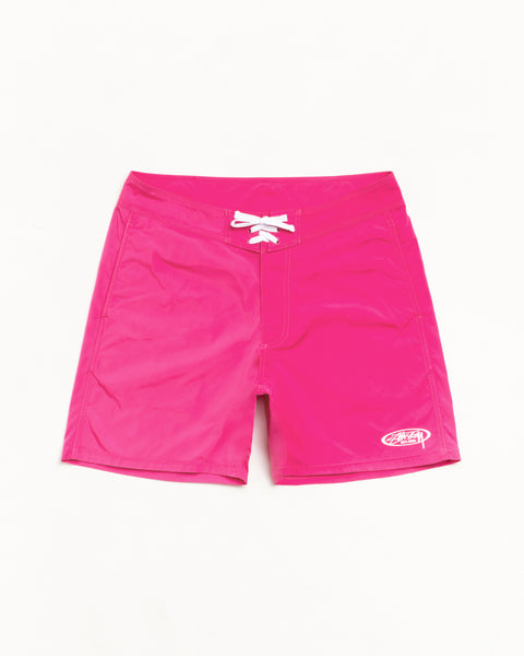 Bright pink board shorts with white lace-up waist and small logo at hem