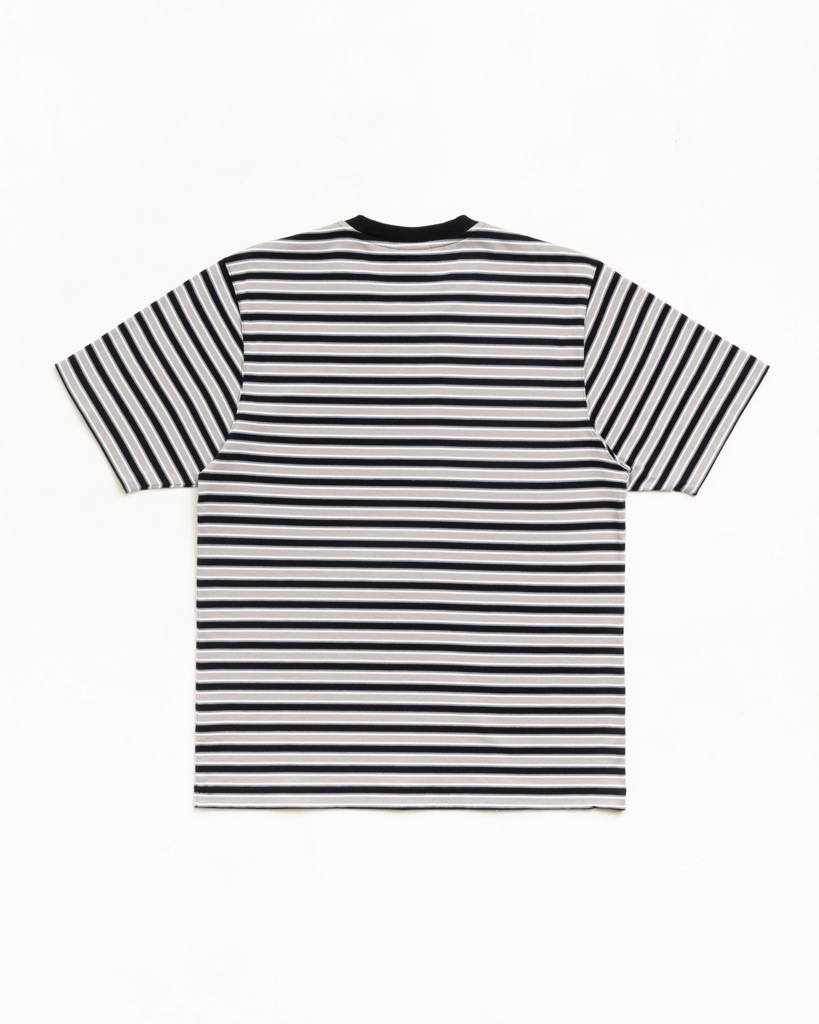 Beach Stripe Tee Unisex Short Sleeve back view in Black with black-and-white stripes and ribbed crew neck