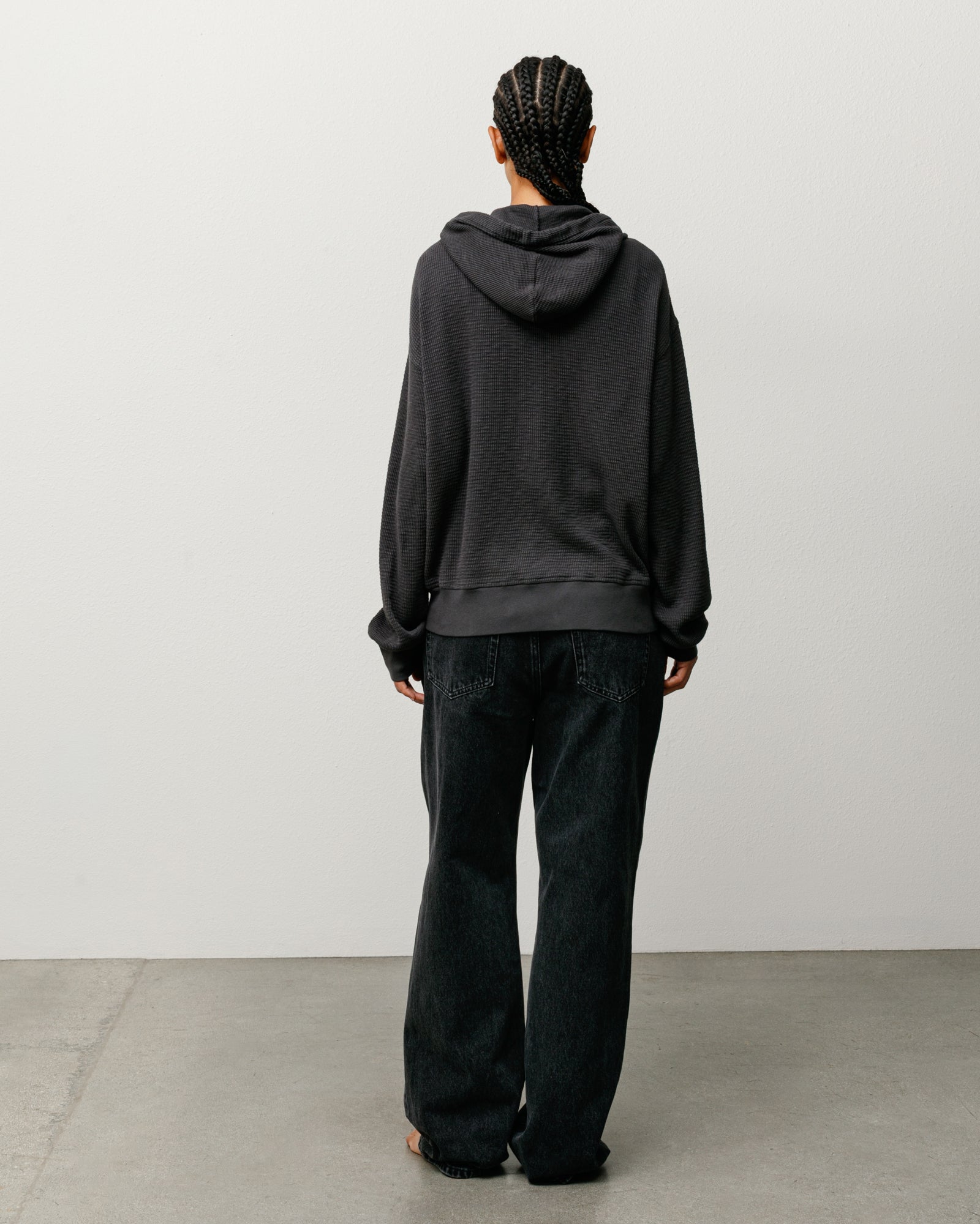 Lightweight Thermal Hoodie Unisex Long Sleeve In Faded Black, Back View On Model