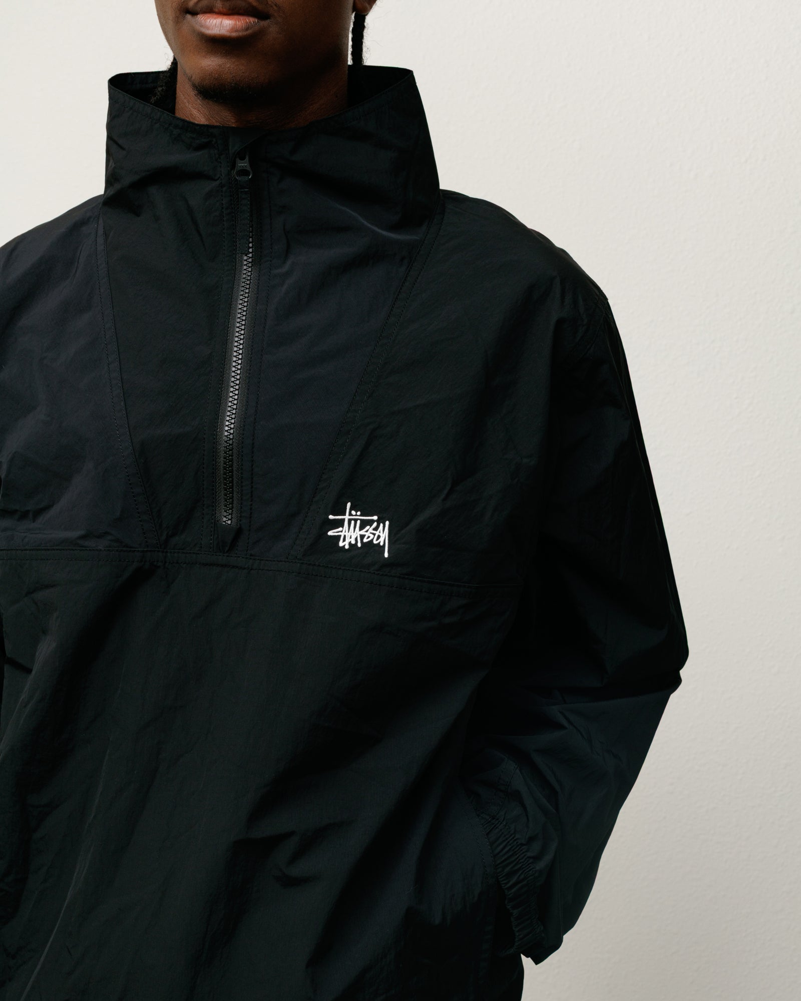 Warm Up Pullover – Black | Outerwear | Stüssy UK