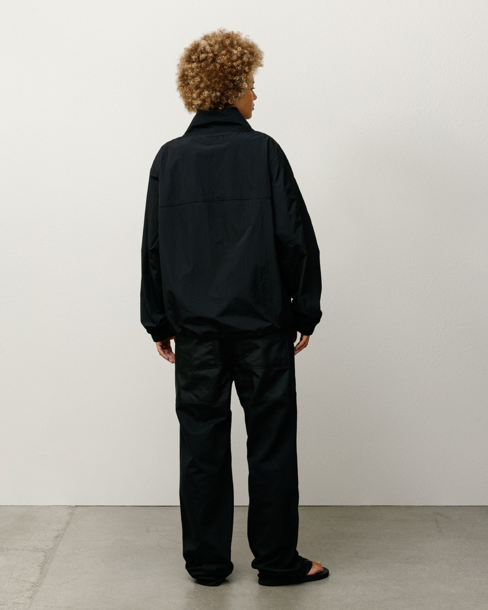 Warm Up Pullover – Black | Outerwear | Stüssy UK