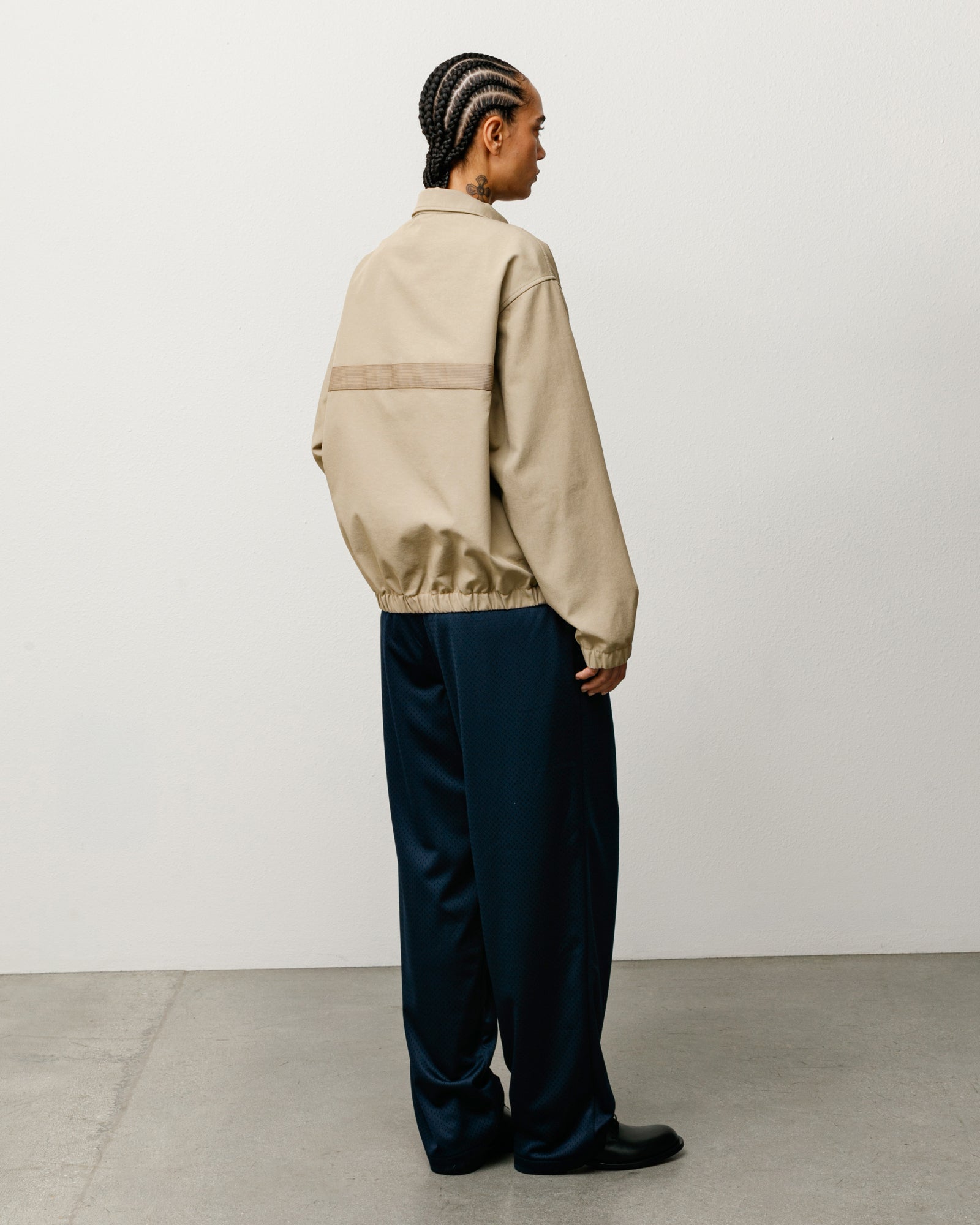 Mechanic Jacket Unisex Long Sleeve In Khaki, back view with elasticated hem detail