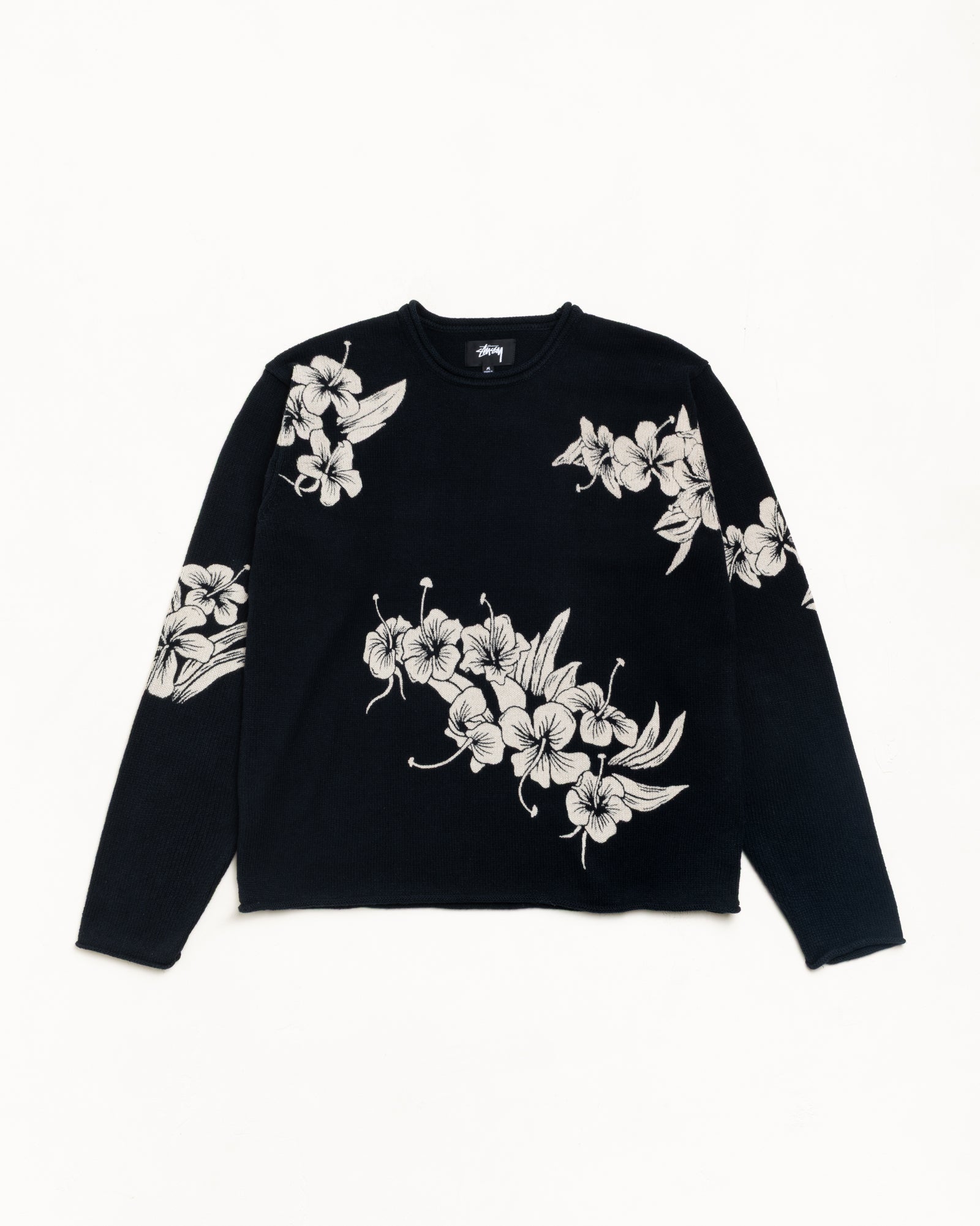 Black long-sleeve knit jumper with white floral pattern, unisex