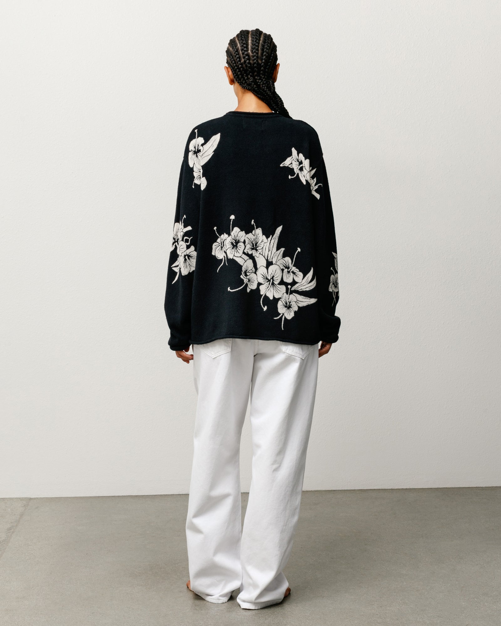 Black floral knit jumper unisex long sleeve, back view