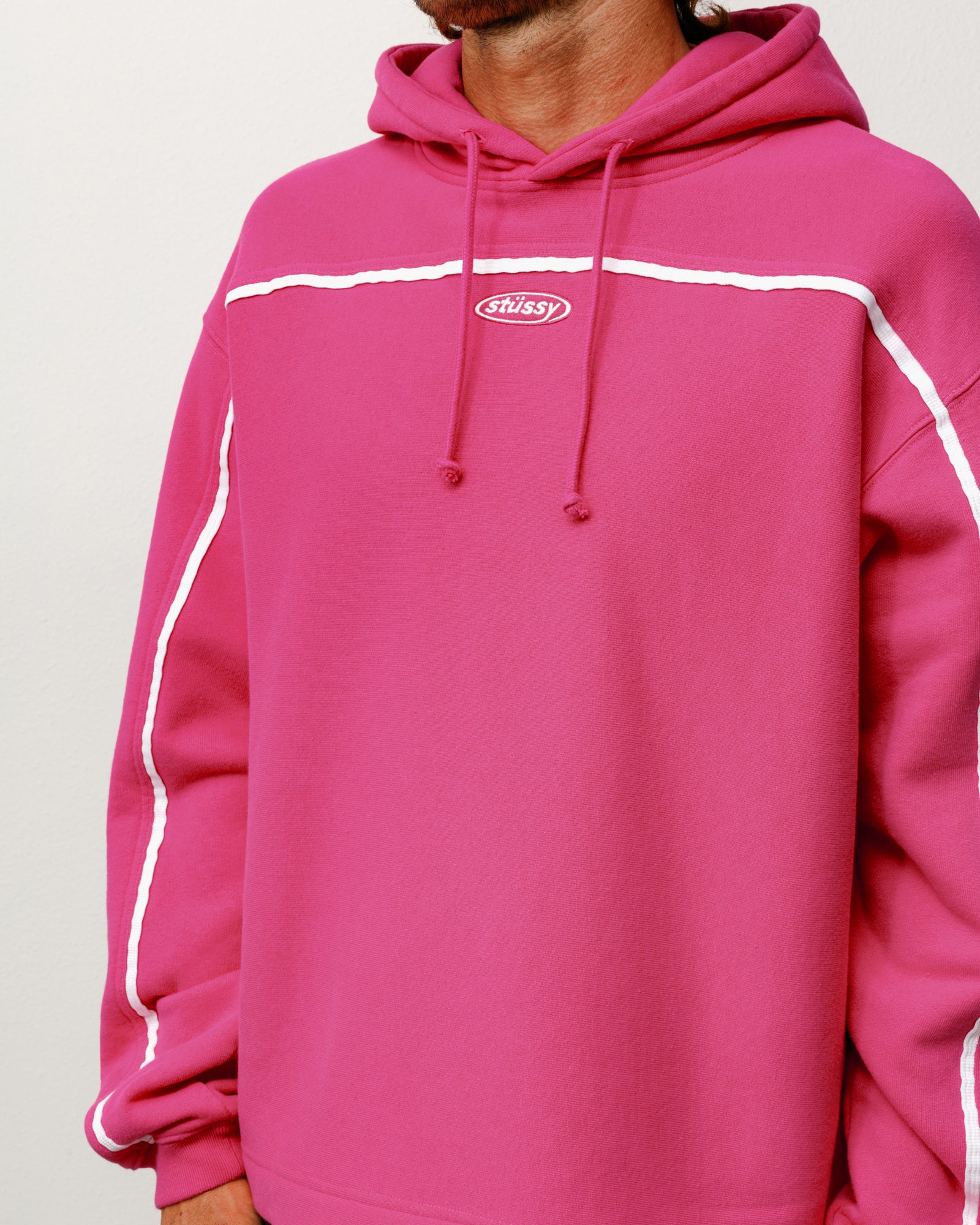 Oval Pullover Hoodie Unisex Long Sleeve In Pink With White Contrast Piping And Oval Chest Logo
