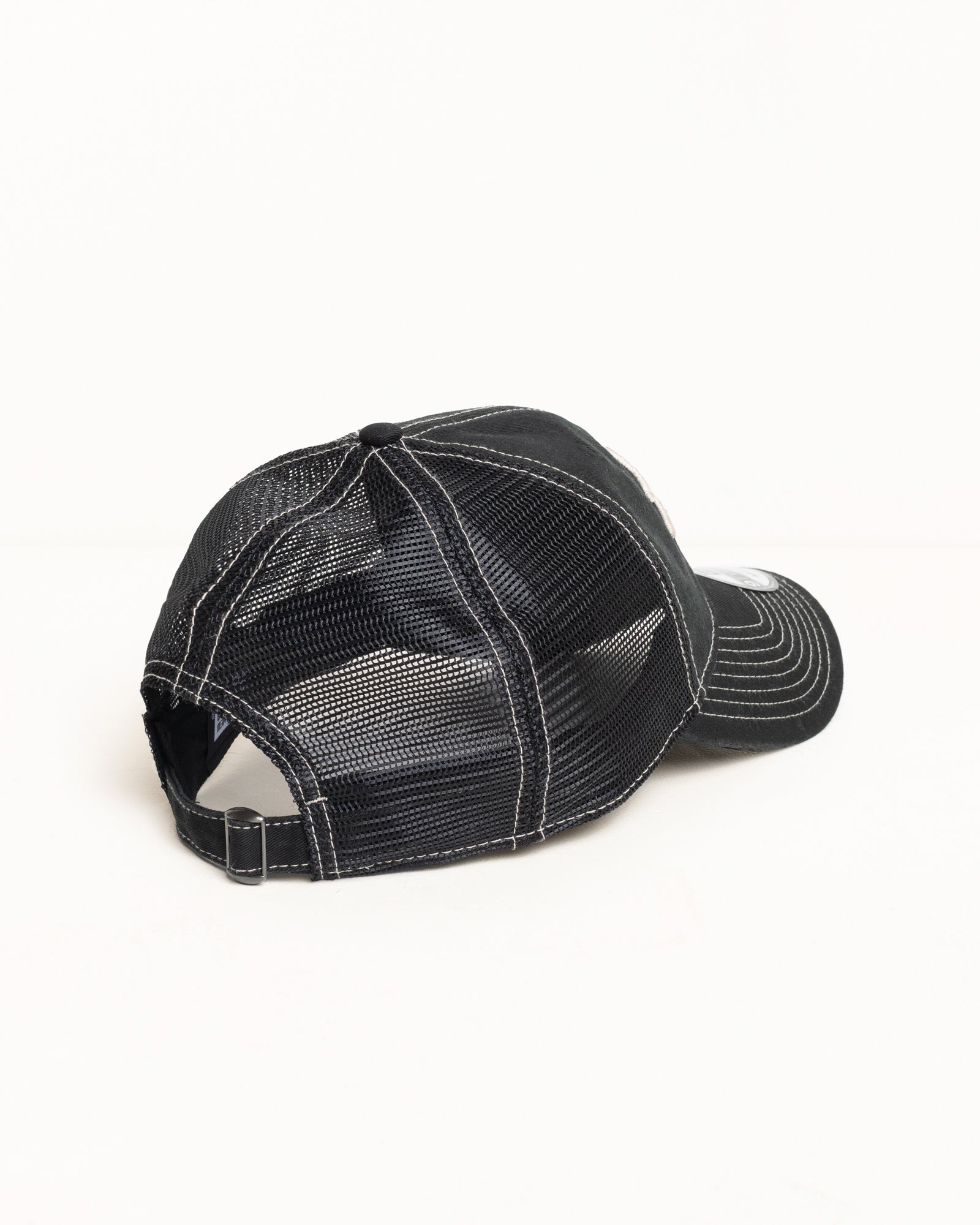 9Twenty Washed Basic Trucker Headwear in the colour Black