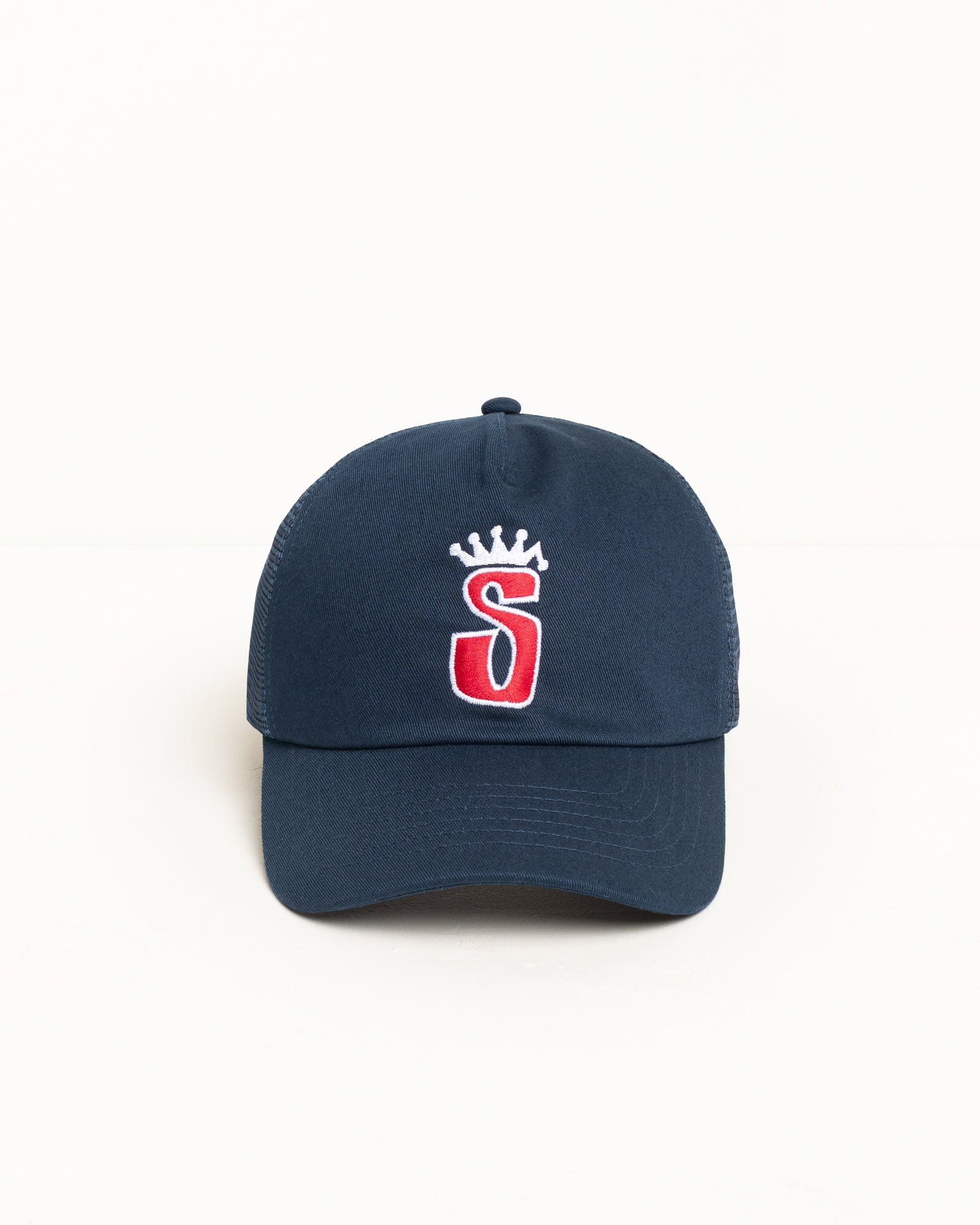 Stüssy S Crown Trucker Snapback Cap in the colour Navy