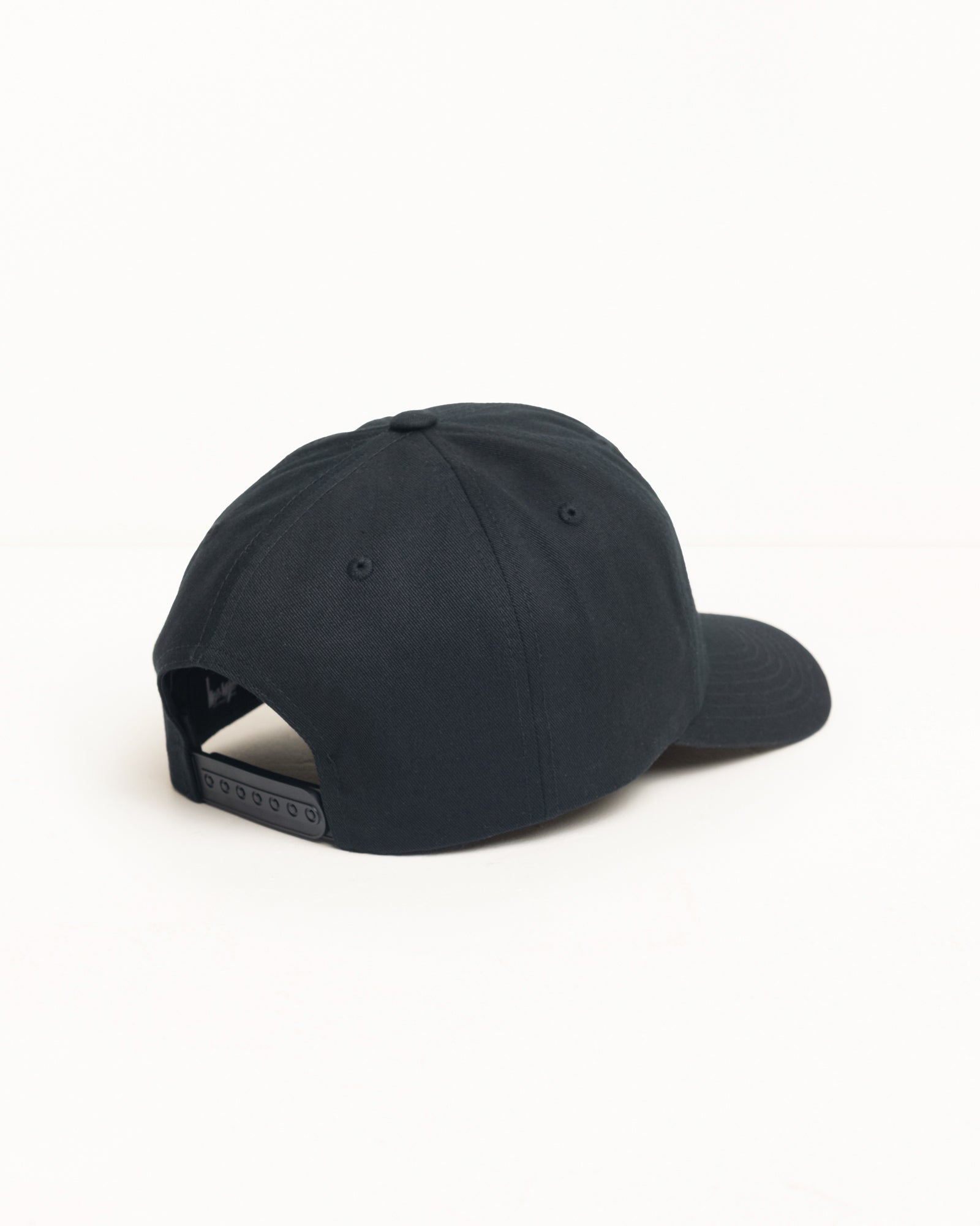 Mid-depth Chenille S Snapback Headwear in the colour Black