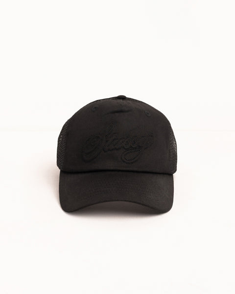 Waxed Cursive Stitch Snapback Trucker – Black | Headwear | Stüssy UK
