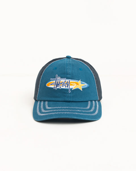 Blue cotton twill low-profile six-panel cap with logo and star embroidery, contrast zigzag stitching