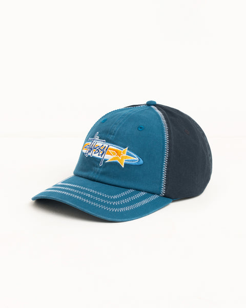 Two-tone blue low-profile cap with star logo embroidery and contrast stitching
