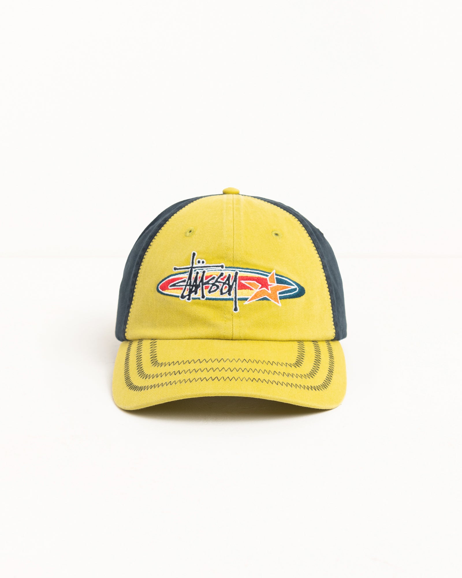 Two-tone lime six-panel cap with oval logo and star embroidery, zig-zag stitched curved brim