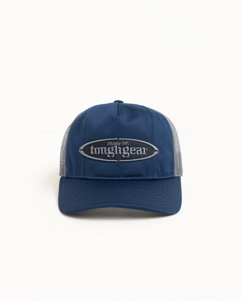 Mid-depth unisex trucker cap in navy with grey mesh sides and raised logo embroidery
