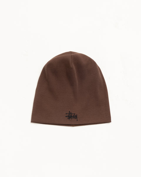 Brown cotton jersey skullcap beanie with black embroidered logo at hem