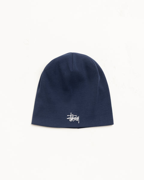 Navy jersey skullcap beanie with white embroidered logo