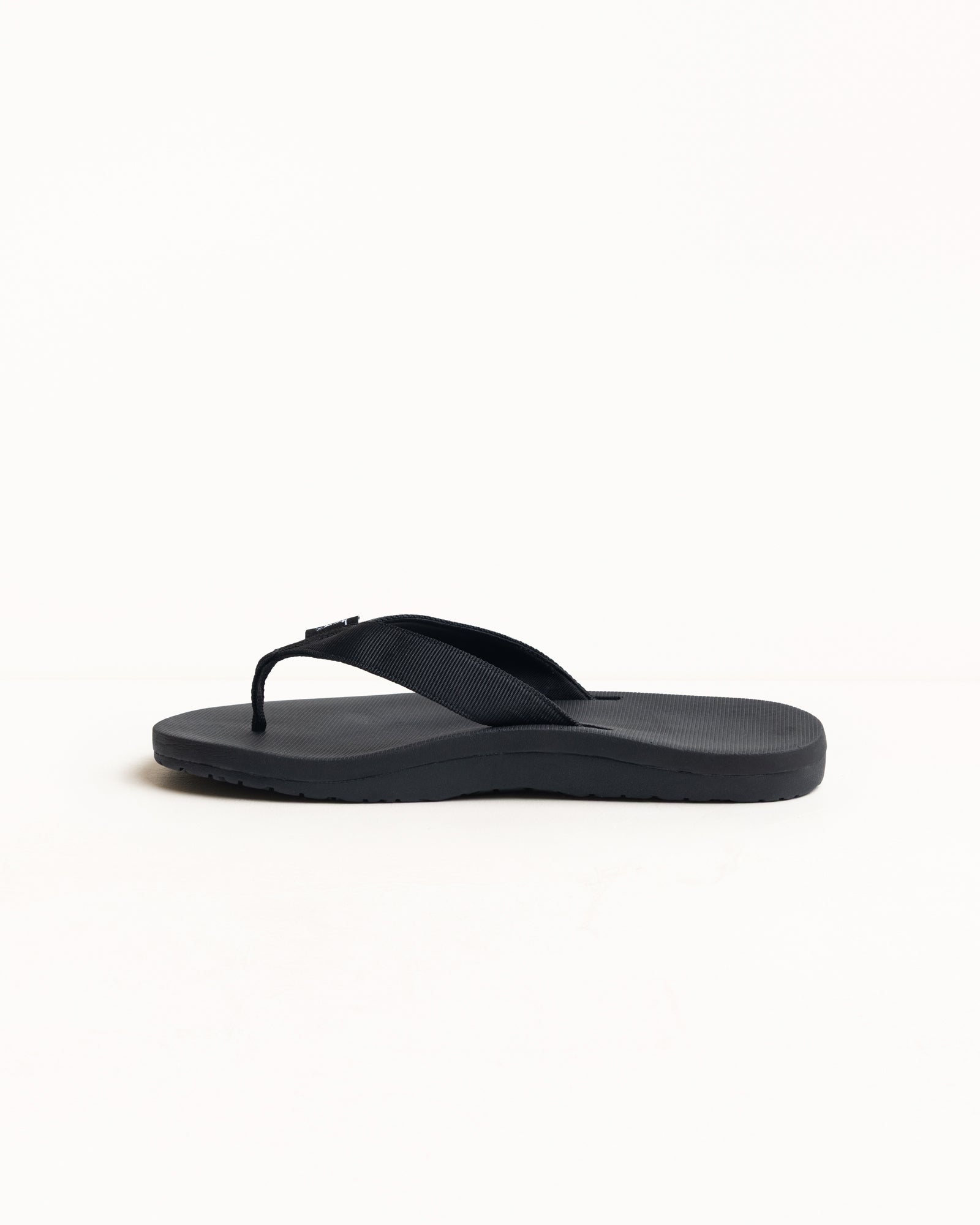 Rubber Flip-Flop Unisex In Black With Wide Nylon Webbing Strap And Textured, Contoured Sole