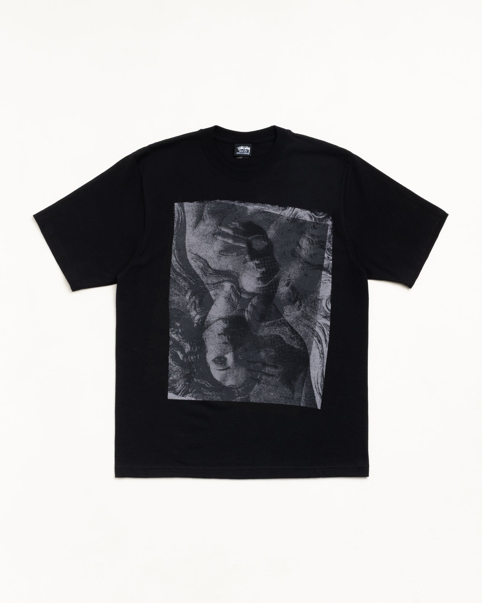 Black unisex short-sleeve tee with large tonal graphic print on front